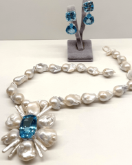 HIDDEN GARDEN 164 KARAT BLUE TOPAZ KÜPE